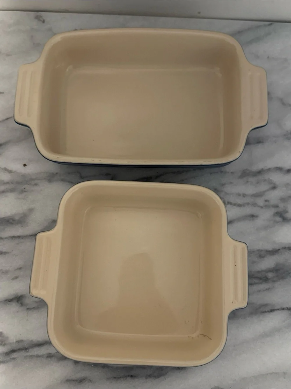 Le Creuset Cream Ceramic Baking Dishes with Blue Rim - Set of 2